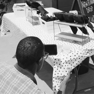 a man taking a picture of a bird