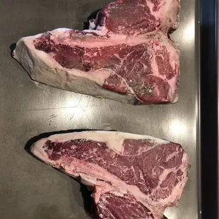 Precooked dry aged porterhouse steaks