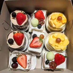 a box of fruit cupcakes