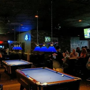 billiards and pool tables in a bar