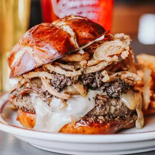 a burger and french fries on a plate