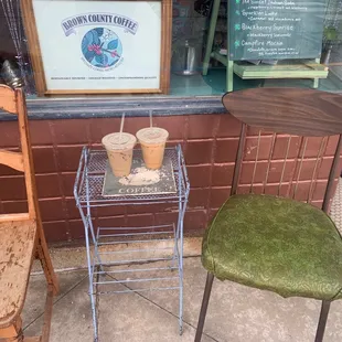 Out front, iced vanilla coffee and iced chai latte