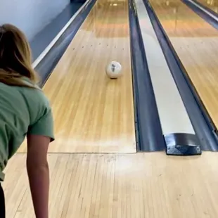 Custom bowling ball rolling down a Cherry Grove Lane