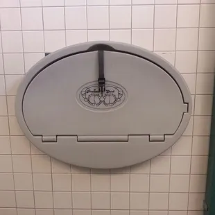 The women&apos;s room has a diaper changing table.