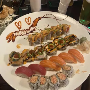 From top to bottom - Pink Dragon Roll, Hot Kiss Roll, Tuna Sushi, Salmon Sushi, Spicy Kani Roll
