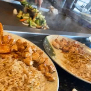 two plates of food on a counter