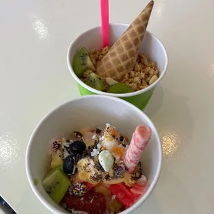 two bowls of fruit and ice cream