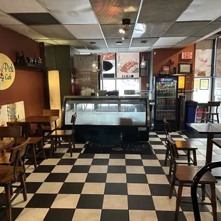 a checkered floor and tables