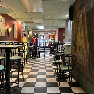 a checkered floor and tables