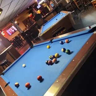 a pool table in a restaurant