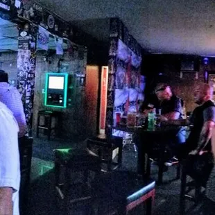 a group of people at a bar
