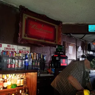 a man standing at a bar
