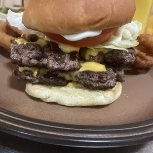 Double Trump Burger! With onion rings! That's a pound of burger! Wow. If your hungry this will fill you up!