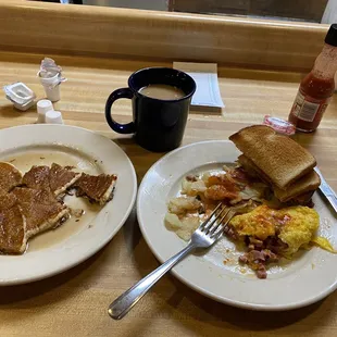 Ham and cheese Omelet, fried potatoes, a pancake, coffee