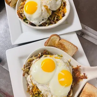 two plates of breakfast food