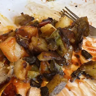 Homefries w peppers and onions burnt to a crisp and dry