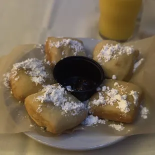 New Orleans style beignets with powdered sugar and jam