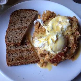 Salmon hash and poached eggs with hollandaise sauce
