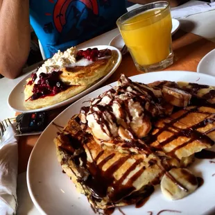 Banana Nutella pancakes with chocolate sauce and mixed berry pancakes