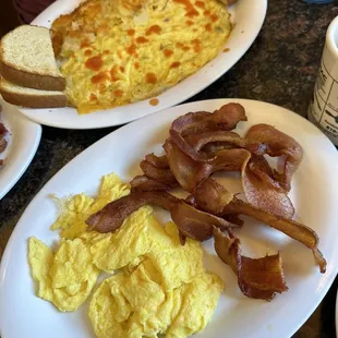 The eggs and bacon with her pancake!! Also, my friends omelet (with hot sauce)