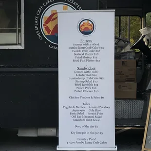 a food truck with a menu