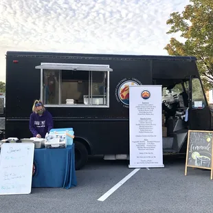 a food truck parked in a parking lot