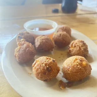 Hush puppies served with honey