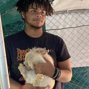 The animals were so docile, but I don't think he was supposed to pick up the bunny! Hard to resist! So adorable