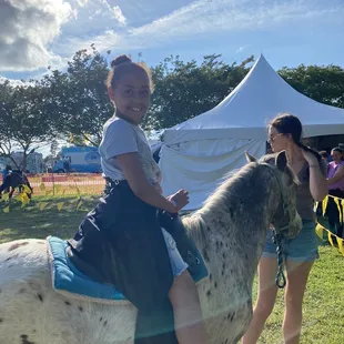 Pony rides and small petting zoo! The kids loved this! I pet a lama! Loved!