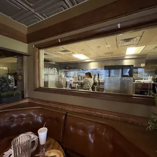 a view of a kitchen through a window