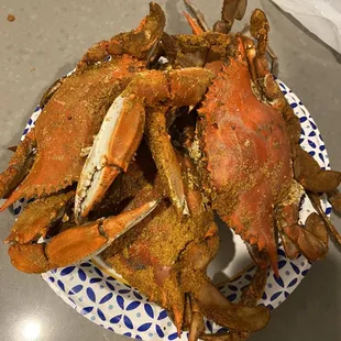 a pile of crabs on a plate