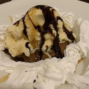 Warm chocolate chip cookie with chocolate, caramel sauce, and whipped cream... soo good