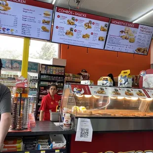 a woman behind the counter