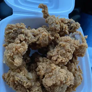 fried chicken in a styrofoam container