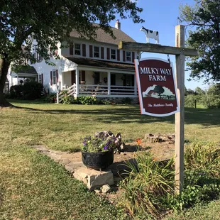 a sign for the milk way farm