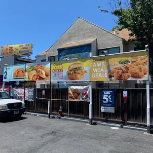 a car parked in front of a restaurant