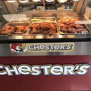 All of the sides and some of the chicken sits under heat lamps.