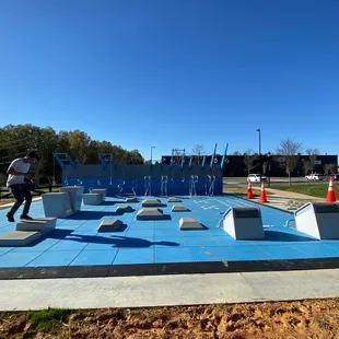 Exercise platforms and rings at the end of the trail