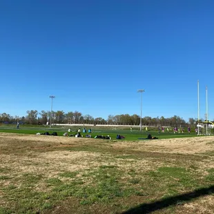 Next to the sand volleyball ball courts is a football field also used as a soccer field