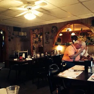 a man and woman sitting at a table