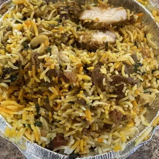 Old dried reused 9.1. Chicken Dum Biriyani - worst ever with raisins and two cashews