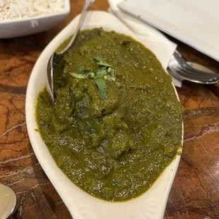Kothamalli Chicken Curry, coriander, cilantro leaves give it the green color