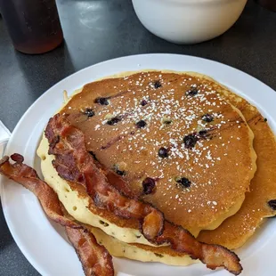 Blueberry pancakes special with bacon