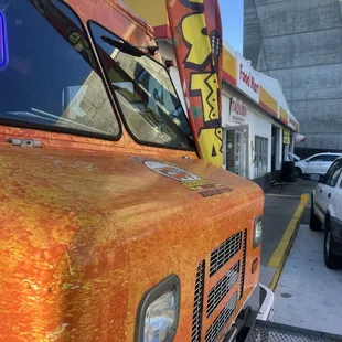 Front of truck, by the Shell station