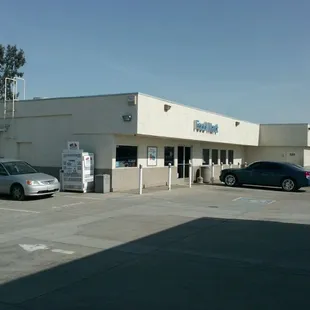 two cars parked in a parking lot