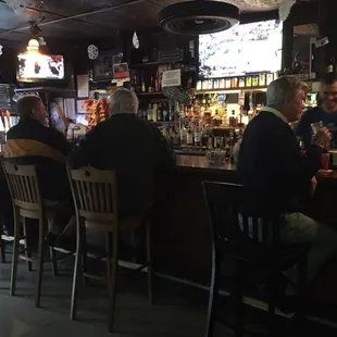 people sitting at the bar