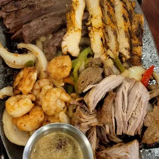 4 Meat Fajitas &quot;chicken, steak, pork, shrimp with chesse, black beans and rice!