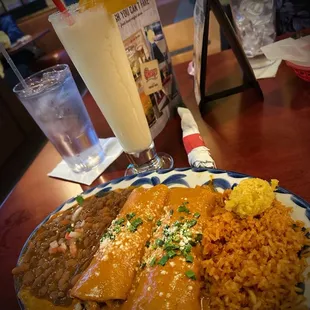 Chipotle chicken enchiladas and pina colada