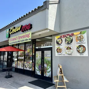 Outside, located in a busy strip mall.