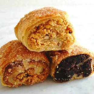 Rugulach in 21 flavors. Sold by 5 lb. bulk or assorted gift boxes online. Cinnamon Walnut, Chocolate, Raspberry, Apricot Currant etc